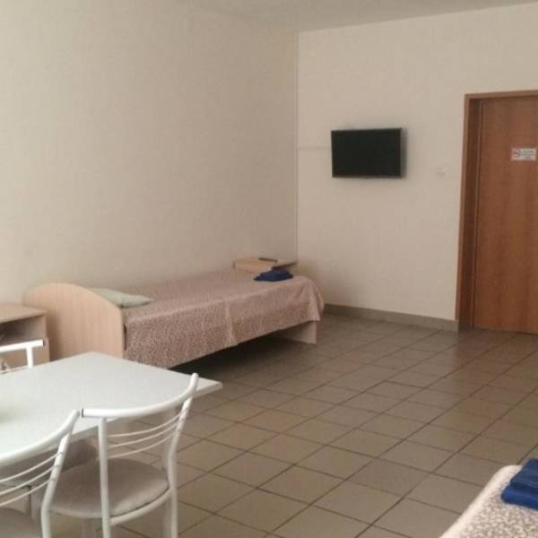 Номер с четырьмя раздельными кроватями